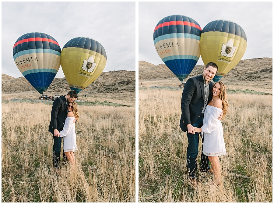 Having just proposed marriage a few moments prior, the newly engaged couple poses for a picture with San Diego Wedding Photographer Marie Monforte, in front of fully inflated Hot Air Balloons they all are about to go ride in.